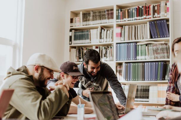 colleagues enjoying modern workplace solutions in small office setting